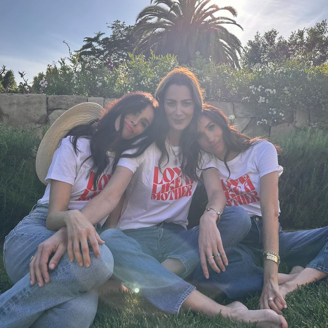 'Inspirational' Meghan Markle cuddles up to closest pals in new intimate photos