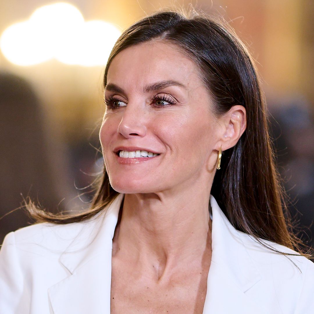 Queen Letizia is divine in unseen figure-skimming linen suit